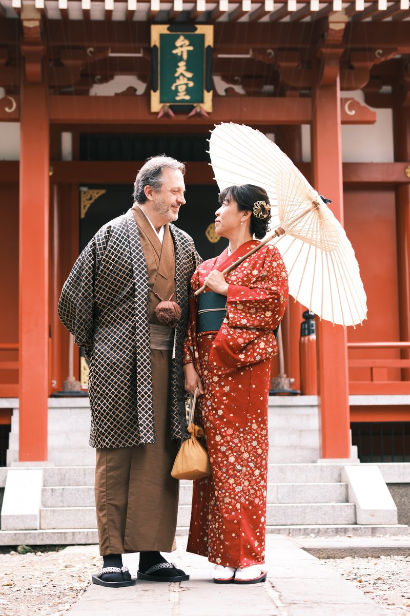 Eddy and Ako in kimono facing each other at Sensoji Temple — Japan 2024